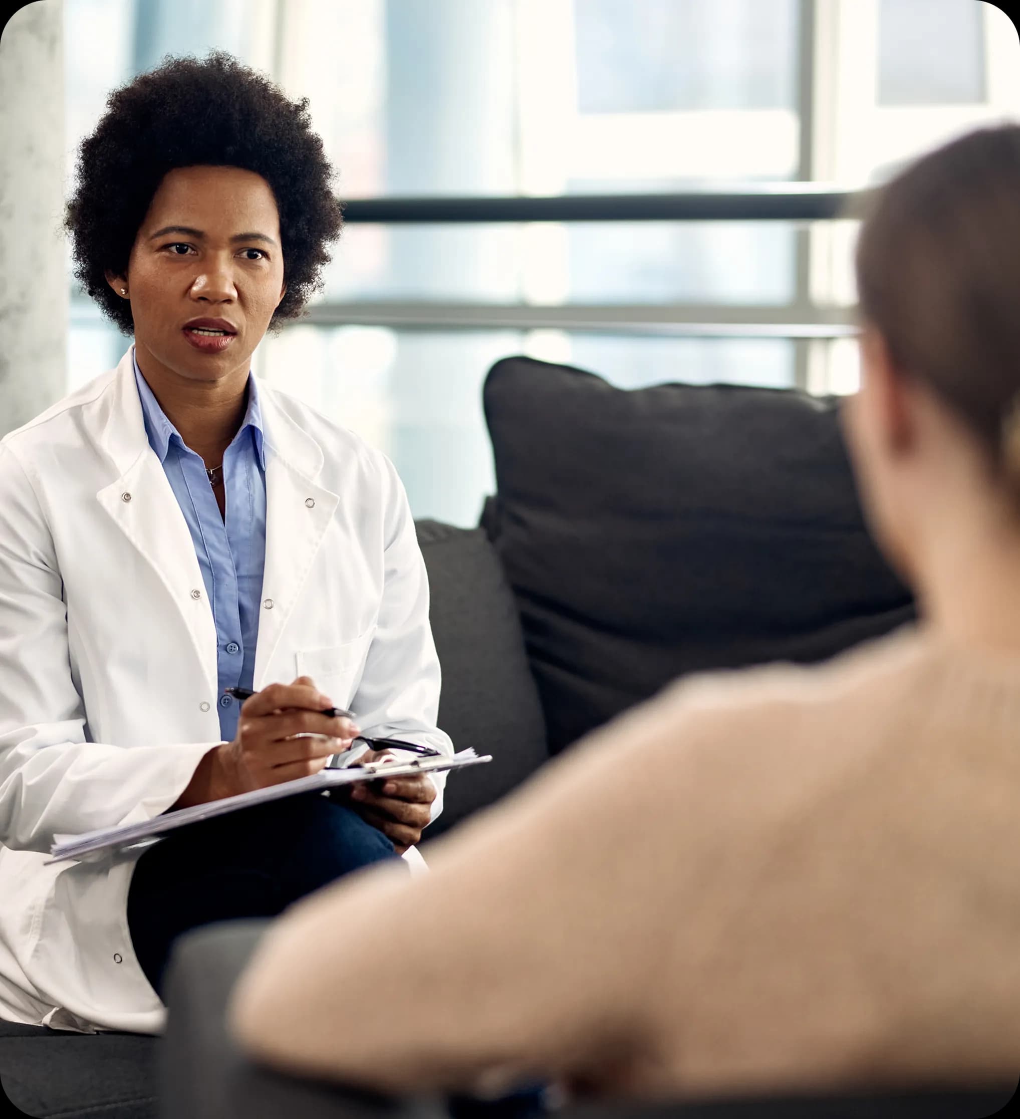 Doctor in consultation with patient